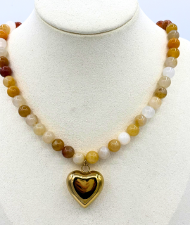 Kralenketting met statement hartbedel